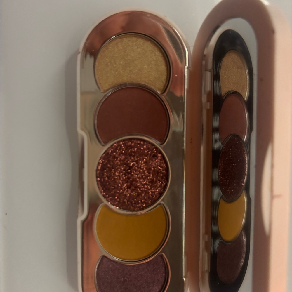 Rare Beauty Eyeshadow Palette with Gold, Brown, and Yellow